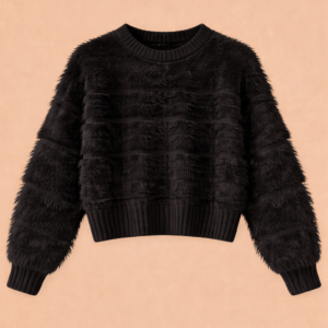 Suéter de peluche negro en fondo cálido